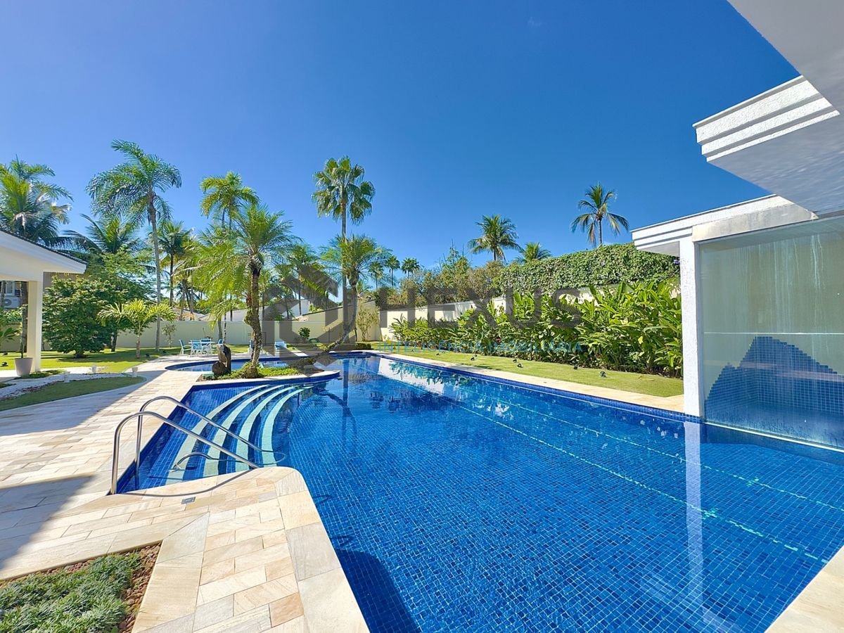 Foto 3 de Casa reformada com piscina e área gourmet no Jardim Acapulco, Guarujá