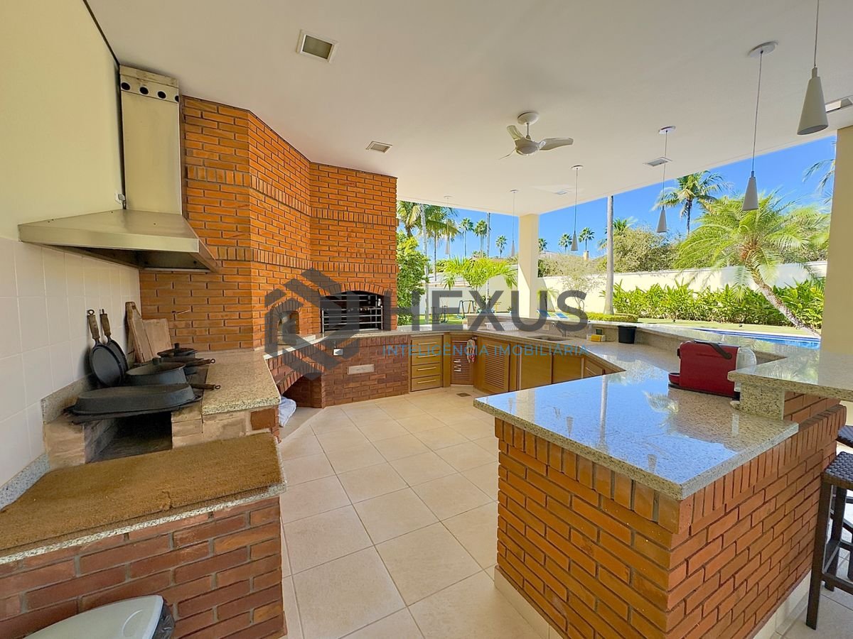 Foto 5 de Casa reformada com piscina e área gourmet no Jardim Acapulco, Guarujá