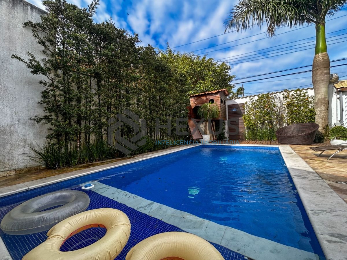 Foto 5 de Casa reformada a 150m da praia na região do Forte dos Andradas no Tombo, Guarujá