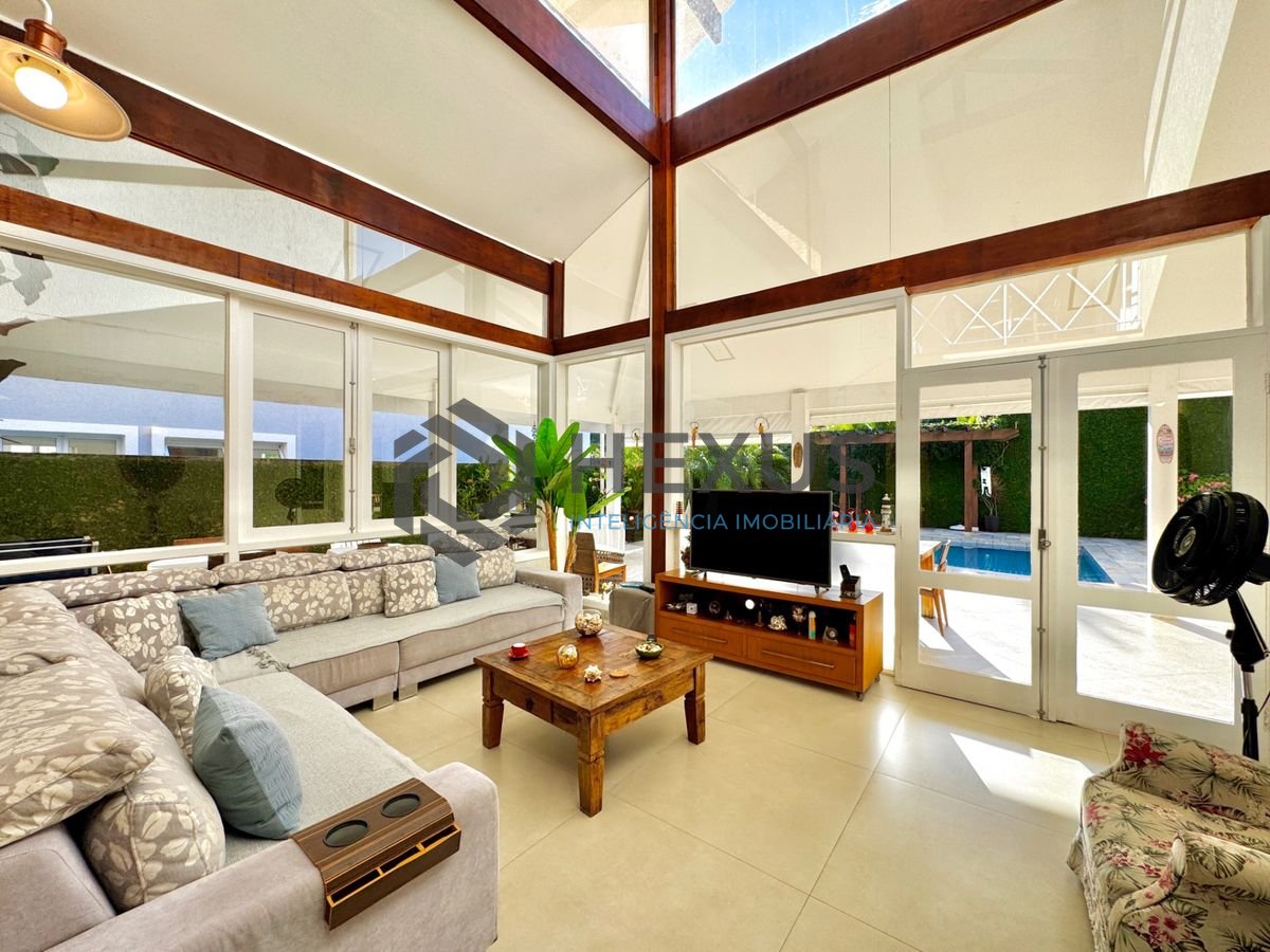Foto 16 de Casa reformada com piscina e área gourmet no Jardim Acapulco, Guarujá