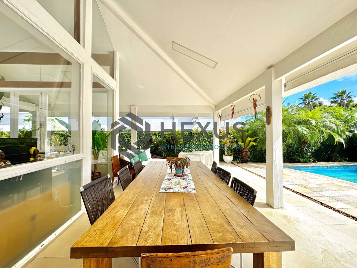 Foto 5 de Casa reformada com piscina e área gourmet no Jardim Acapulco, Guarujá