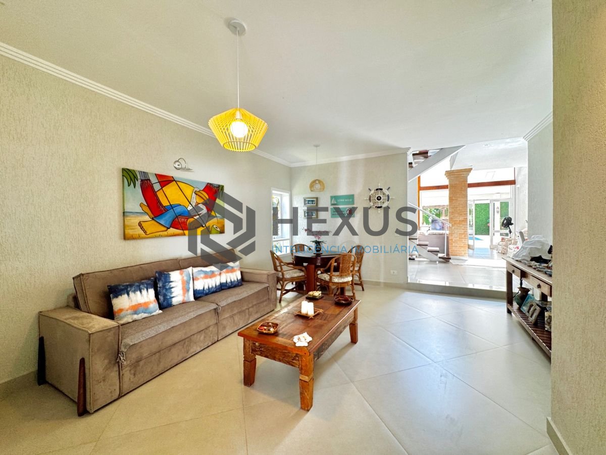Foto 14 de Casa reformada com piscina e área gourmet no Jardim Acapulco, Guarujá