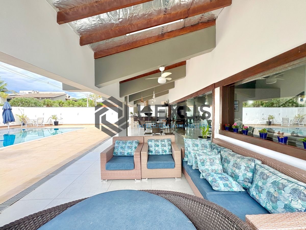 Foto 4 de Casa reformada com piscina e área gourmet no Jardim Acapulco, Guarujá