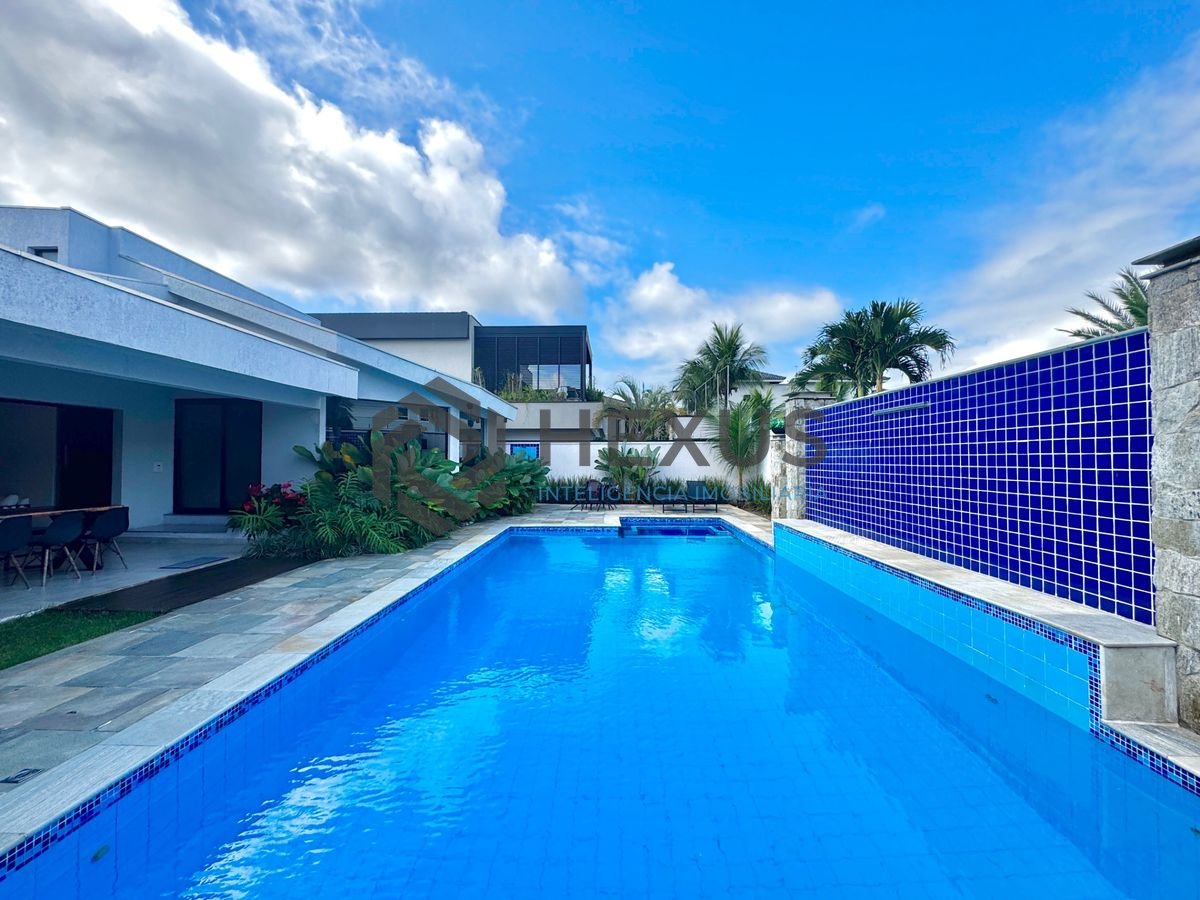 Foto 11 de Casa reformada com piscina e área gourmet no Jardim Acapulco, Guarujá