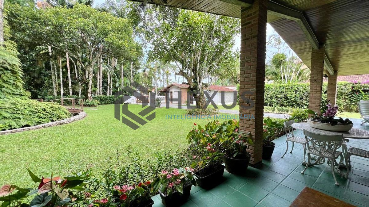 Foto 9 de Casa com lago área gourmet e piscina no Jardim Guaiuba, Guarujá