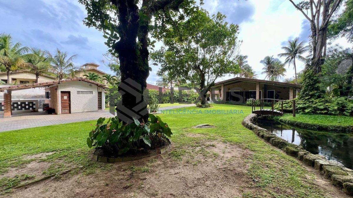 Foto 4 de Casa com lago área gourmet e piscina no Jardim Guaiuba, Guarujá