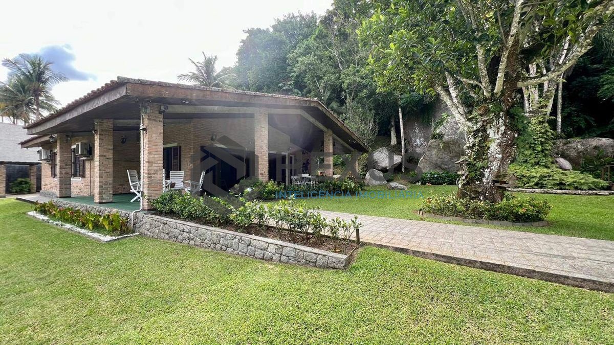 Foto 26 de Casa com lago área gourmet e piscina no Jardim Guaiuba, Guarujá