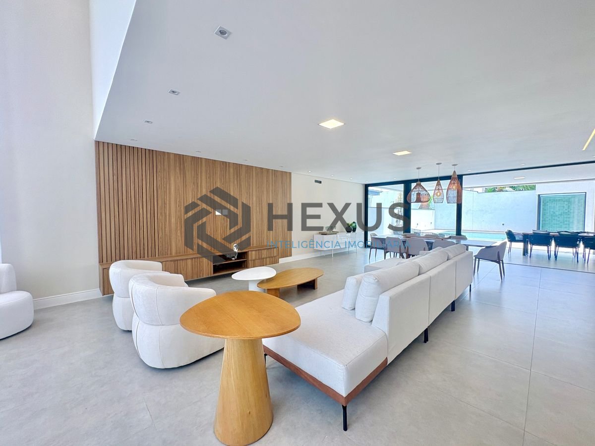 Foto 6 de Casa reformada com piscina e área gourmet no Jardim Acapulco, Guarujá