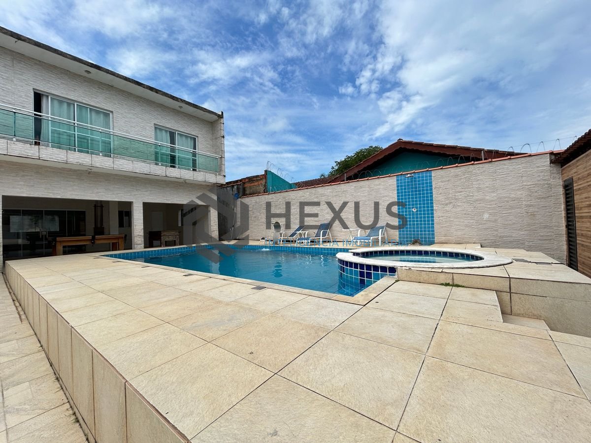 Foto 3 de Casa com piscina e área gourmet no Pernambuco, Guarujá