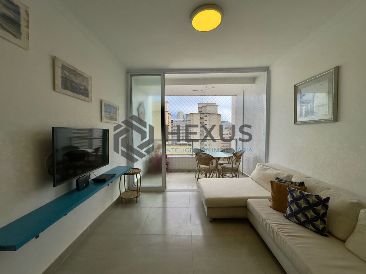 Foto 4 de Apartamento reformado com varanda vista mar na beira mar nas Pitangueiras, Guarujá