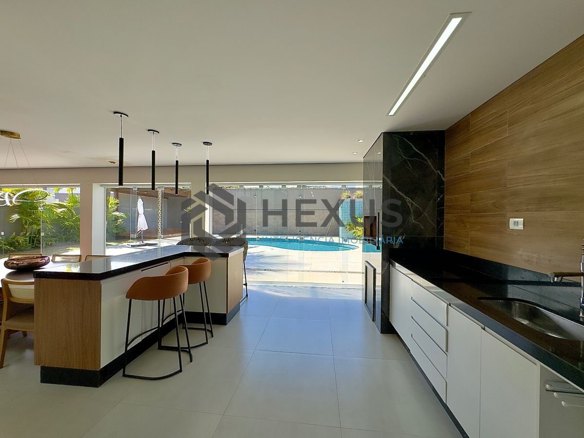 Foto 6 de Casa reformada com piscina e área gourmet no Jardim Acapulco, Guarujá