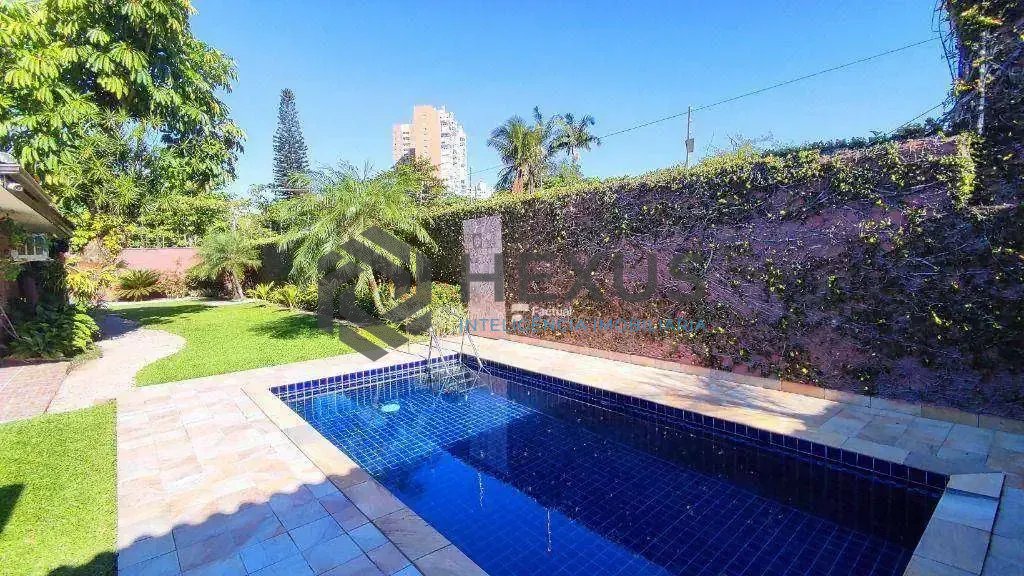 Foto 2 de Casa com piscina e área gourmet no Jardim Virgínia, Enseada - Guarujá/SP