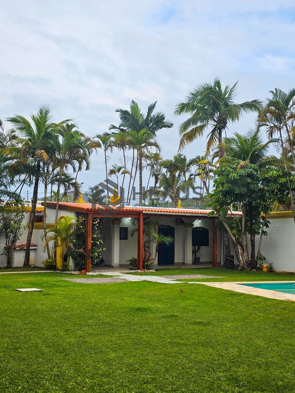 Foto 41 de Casa com piscina e churrasqueira no Balneário Pernambuco, Guarujá