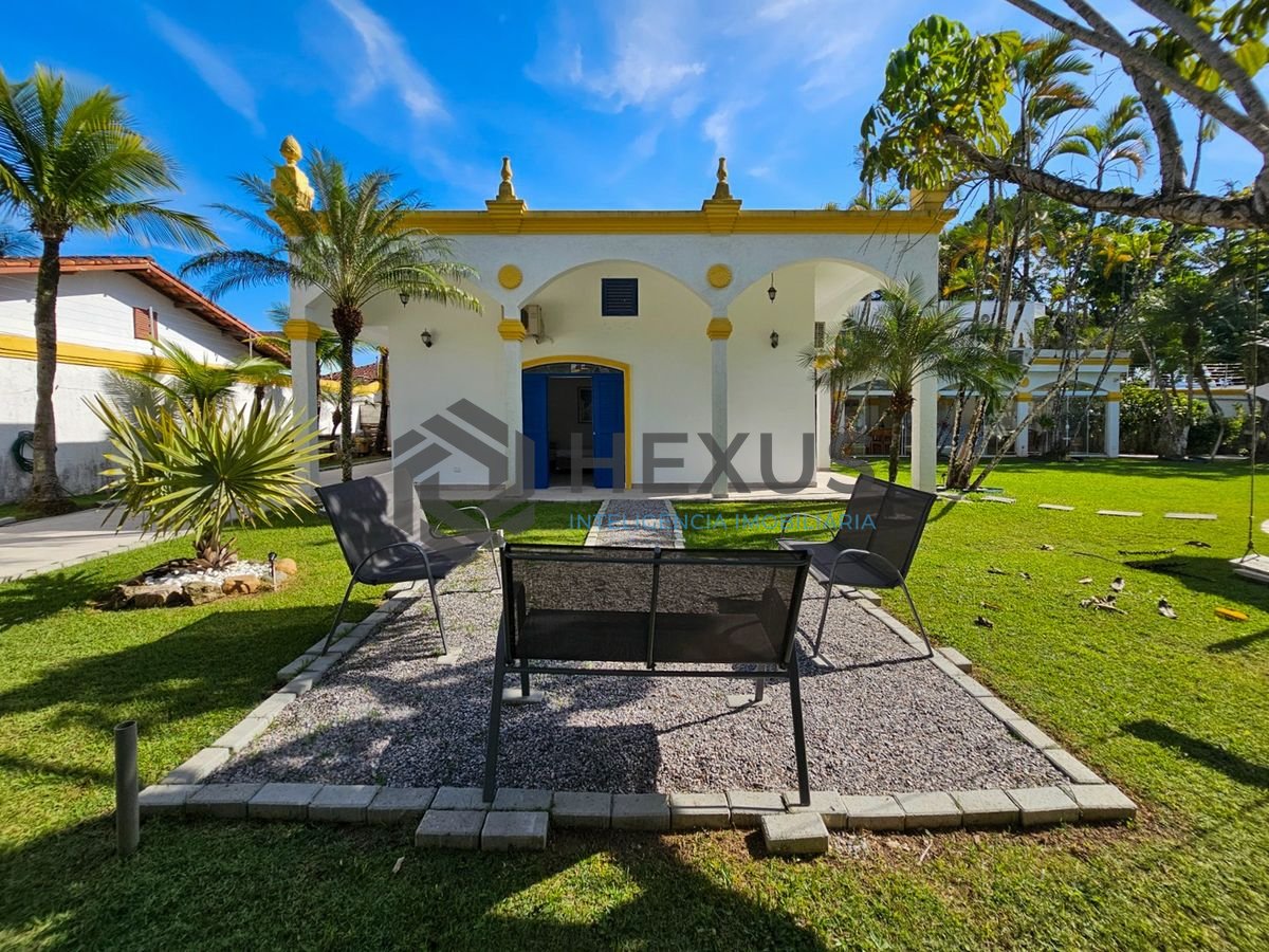 Foto 38 de Casa com piscina e churrasqueira no Balneário Pernambuco, Guarujá
