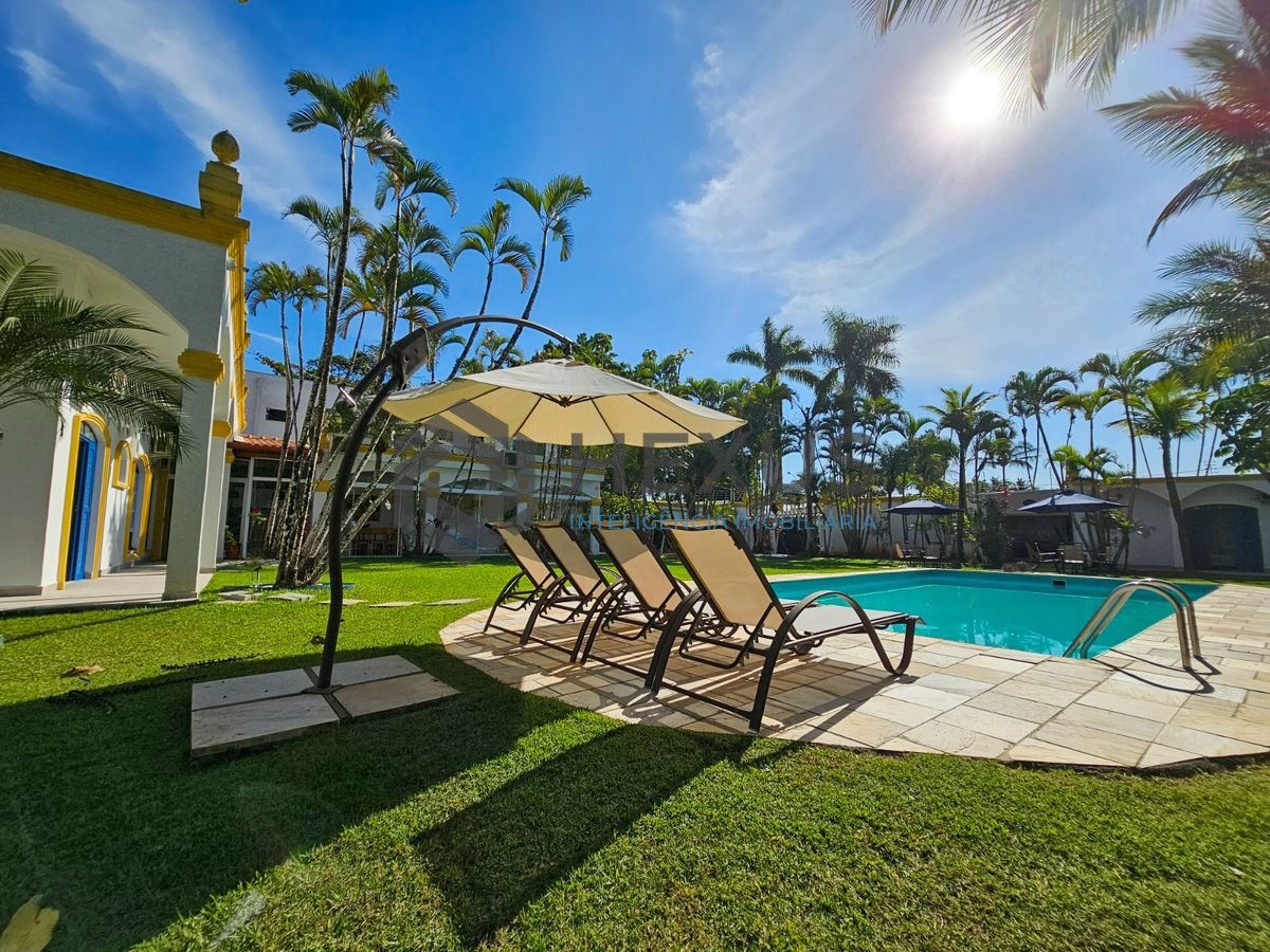 Foto 30 de Casa com piscina e churrasqueira no Balneário Pernambuco, Guarujá