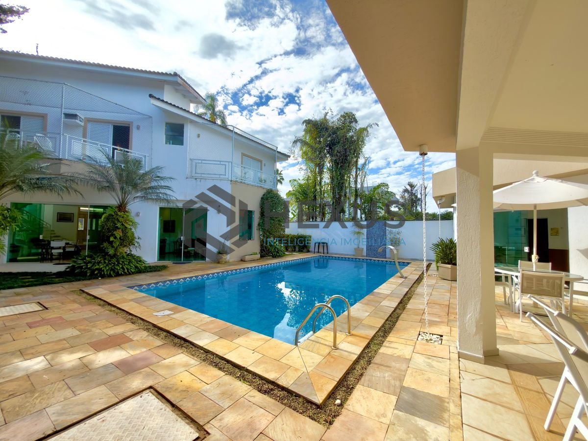Foto 5 de Casa com piscina e área gourmet no Jardim Acapulco, Guarujá