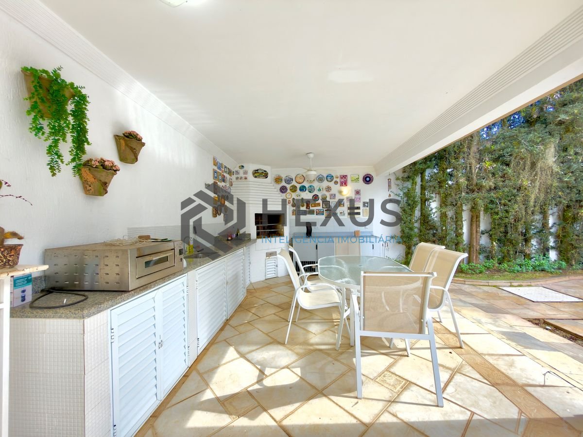 Foto 7 de Casa com piscina e área gourmet no Jardim Acapulco, Guarujá