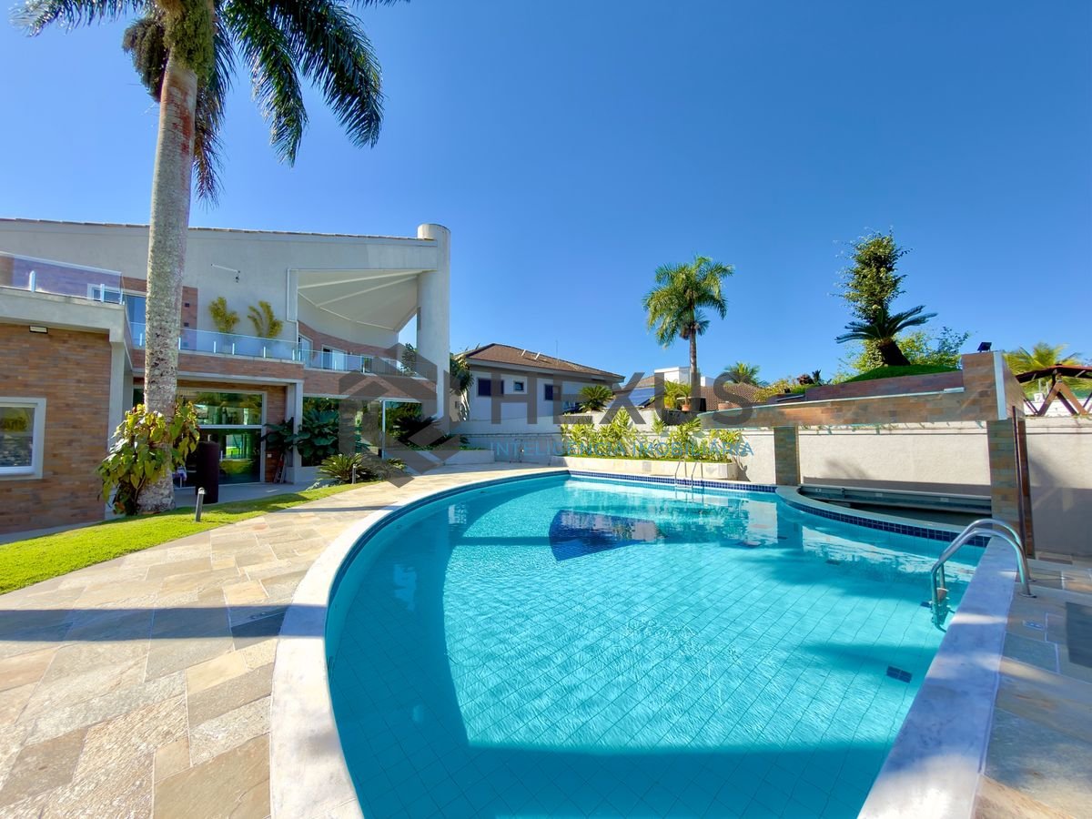 Foto 2 de Casa de alto padrão com piscina e área gourmet no Jardim Acapulco, Guarujá