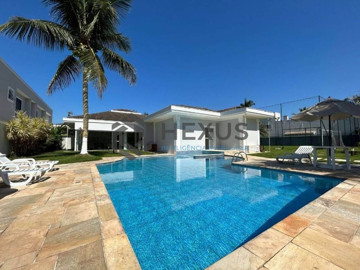 Foto 31 de Casa reformada com piscina e área gourmet no Jardim Acapulco, Guarujá