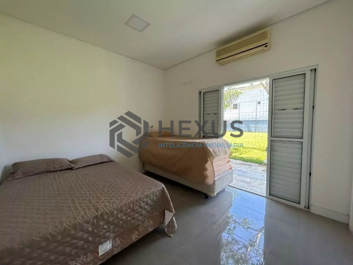 Foto 9 de Casa reformada com piscina e área gourmet no Jardim Acapulco, Guarujá