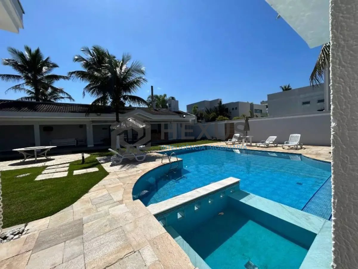 Foto 30 de Casa reformada com piscina e área gourmet no Jardim Acapulco, Guarujá