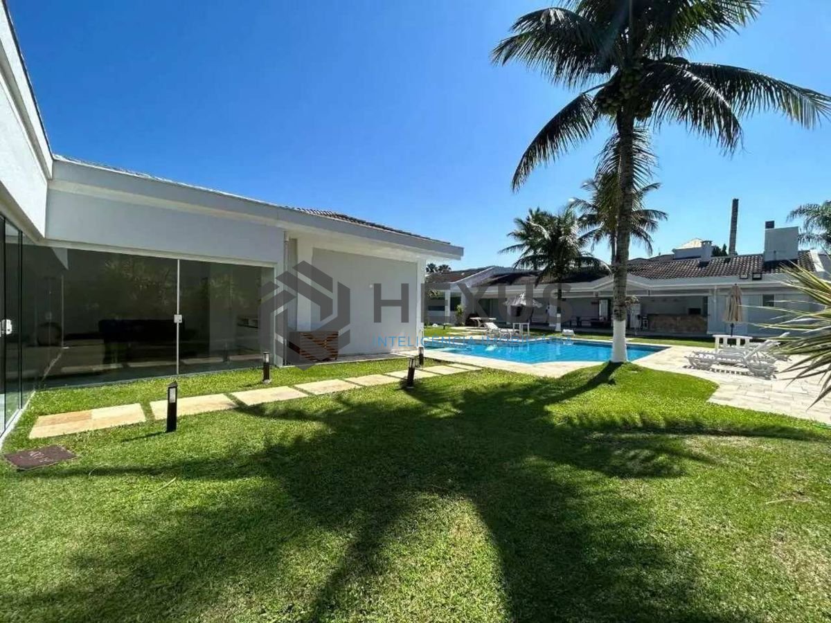 Foto 24 de Casa reformada com piscina e área gourmet no Jardim Acapulco, Guarujá