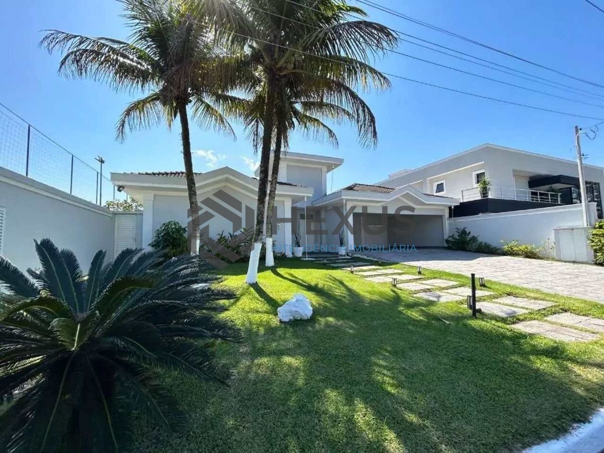 Foto 21 de Casa reformada com piscina e área gourmet no Jardim Acapulco, Guarujá