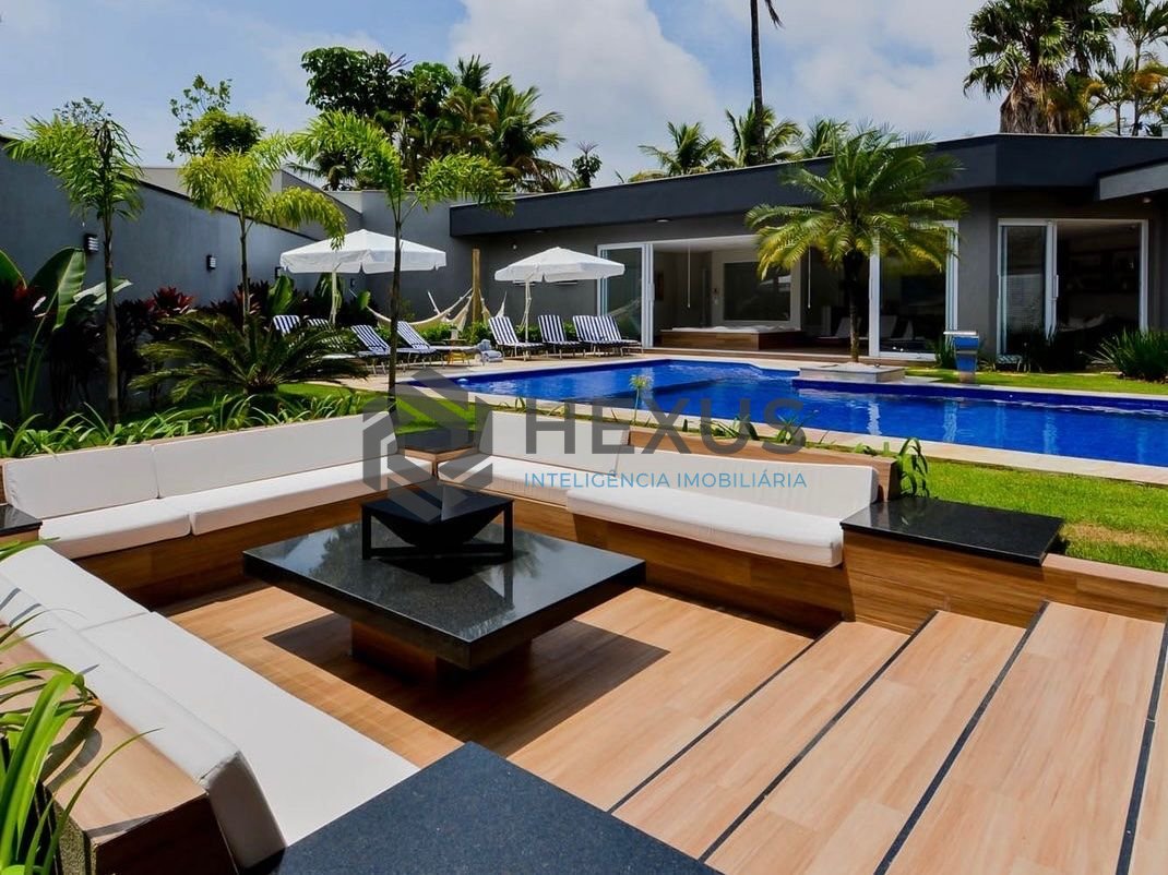 Foto 5 de Casa de alto padrão com piscina e área gourmet no Jardim Acapulco à venda, Guarujá-SP.