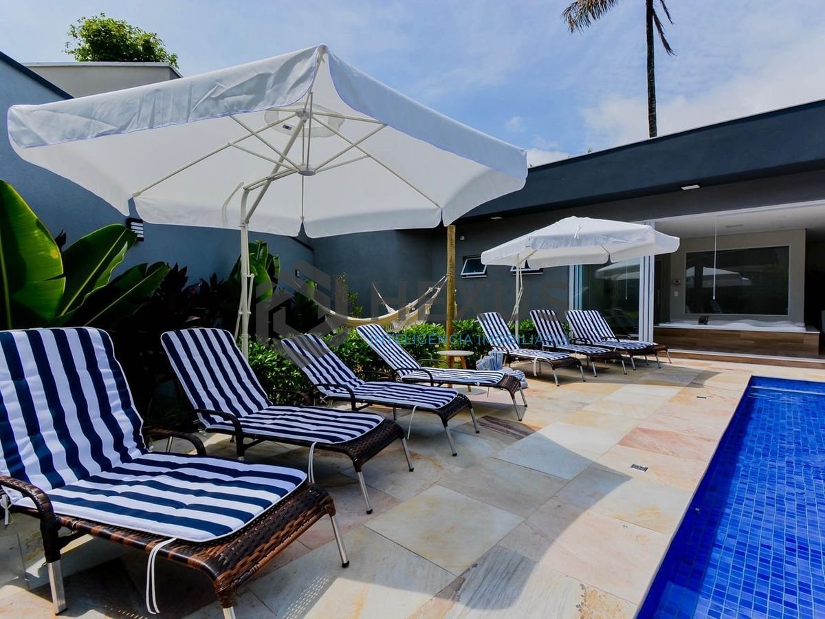 Foto 38 de Casa de alto padrão com piscina e área gourmet no Jardim Acapulco à venda, Guarujá-SP.