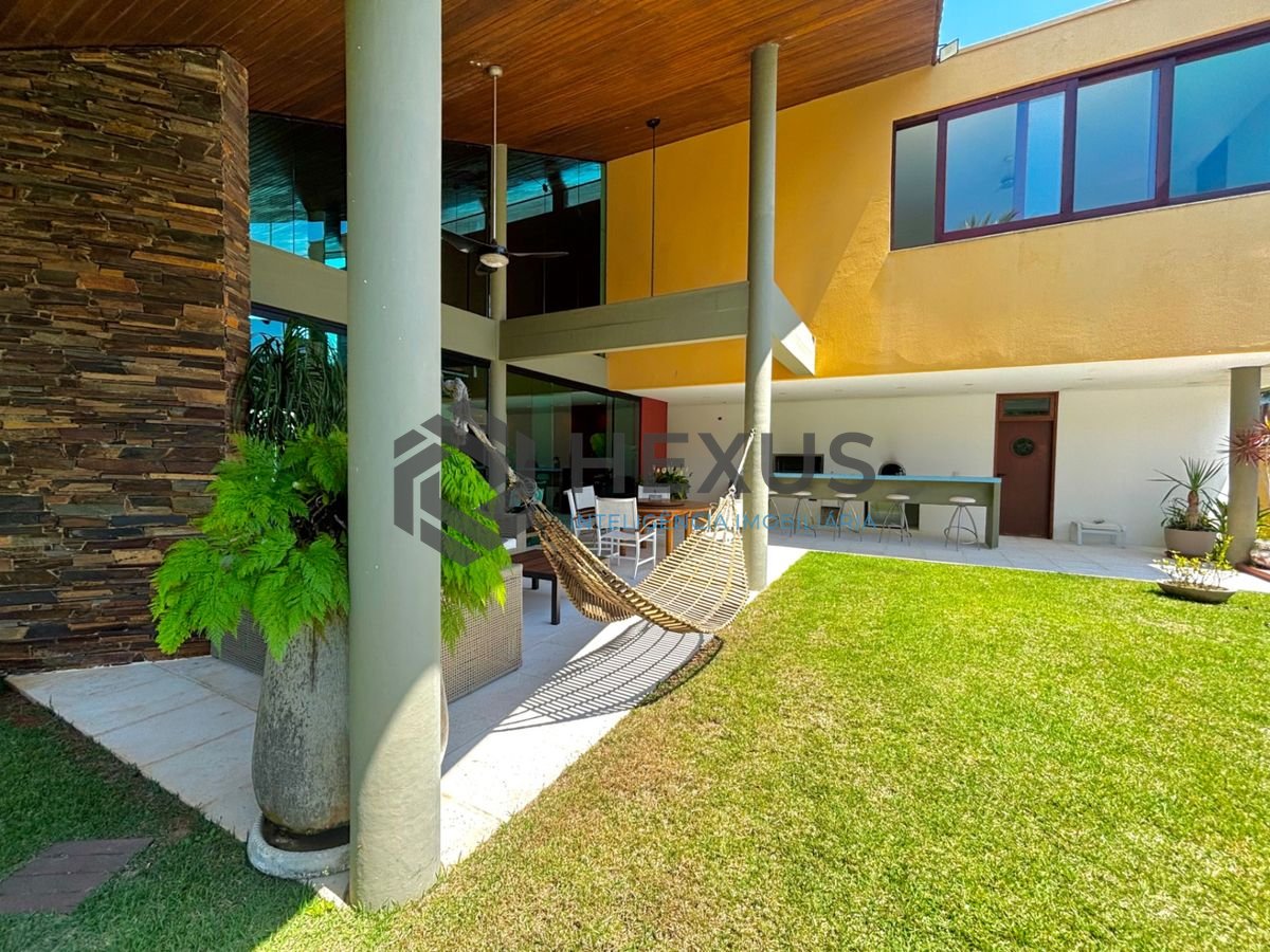 Foto 11 de Casa reformada com piscina e área gourmet no Jardim Acapulco, Guarujá
