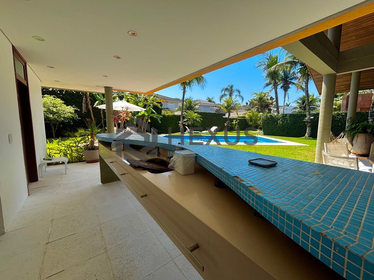 Foto 16 de Casa reformada com piscina e área gourmet no Jardim Acapulco, Guarujá