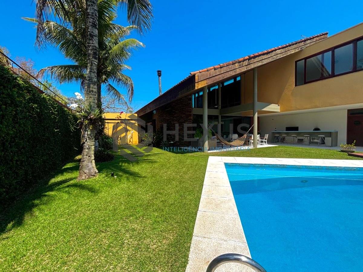 Foto 9 de Casa reformada com piscina e área gourmet no Jardim Acapulco, Guarujá