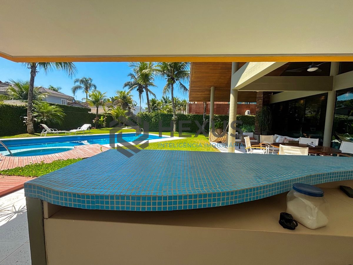 Foto 17 de Casa reformada com piscina e área gourmet no Jardim Acapulco, Guarujá