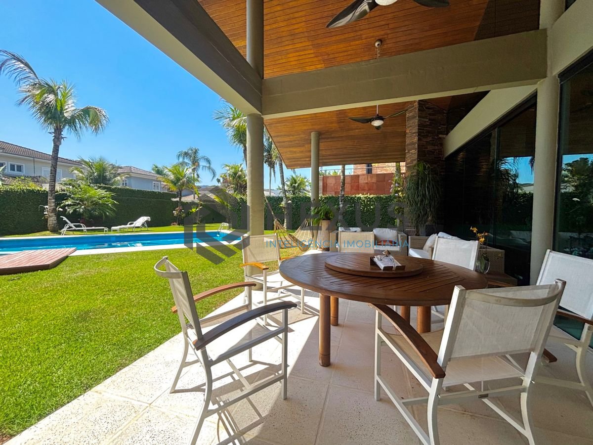 Foto 7 de Casa reformada com piscina e área gourmet no Jardim Acapulco, Guarujá