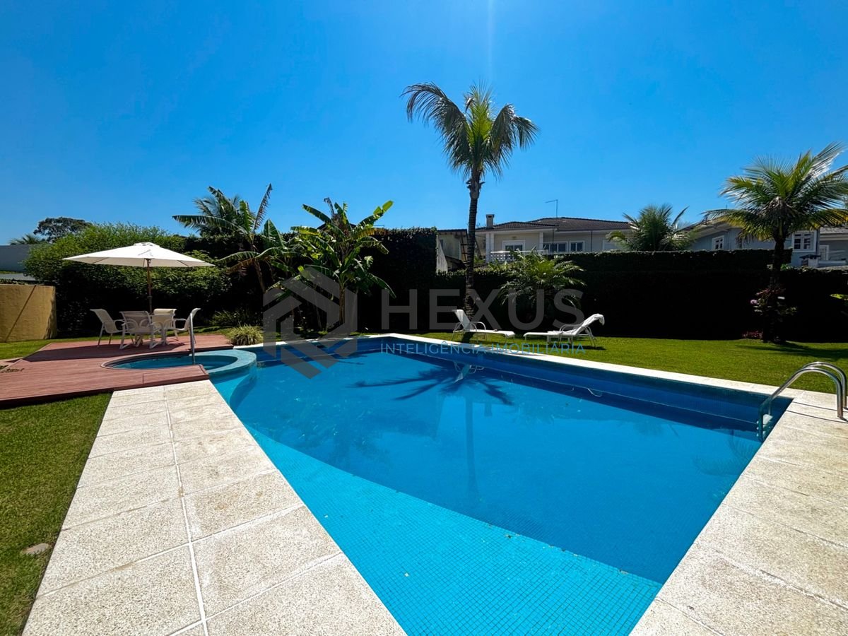 Foto 13 de Casa reformada com piscina e área gourmet no Jardim Acapulco, Guarujá