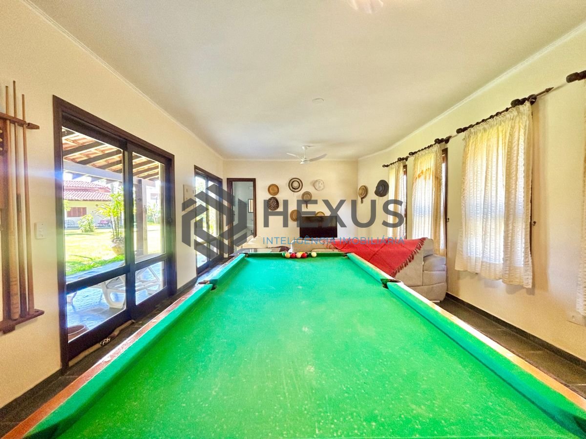 Foto 18 de Casa reformada com piscina e área gourmet no Jardim Acapulco, Guarujá