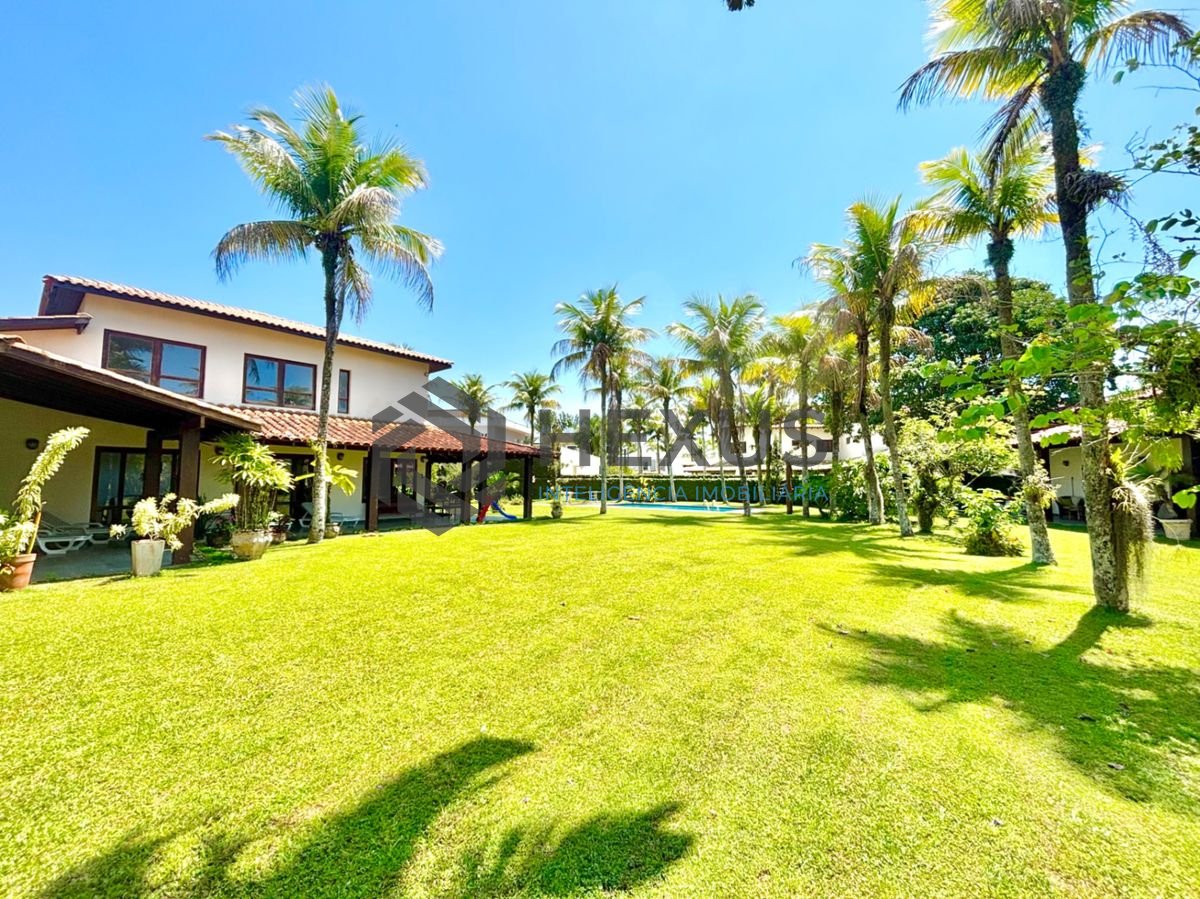 Foto 6 de Casa reformada com piscina e área gourmet no Jardim Acapulco, Guarujá
