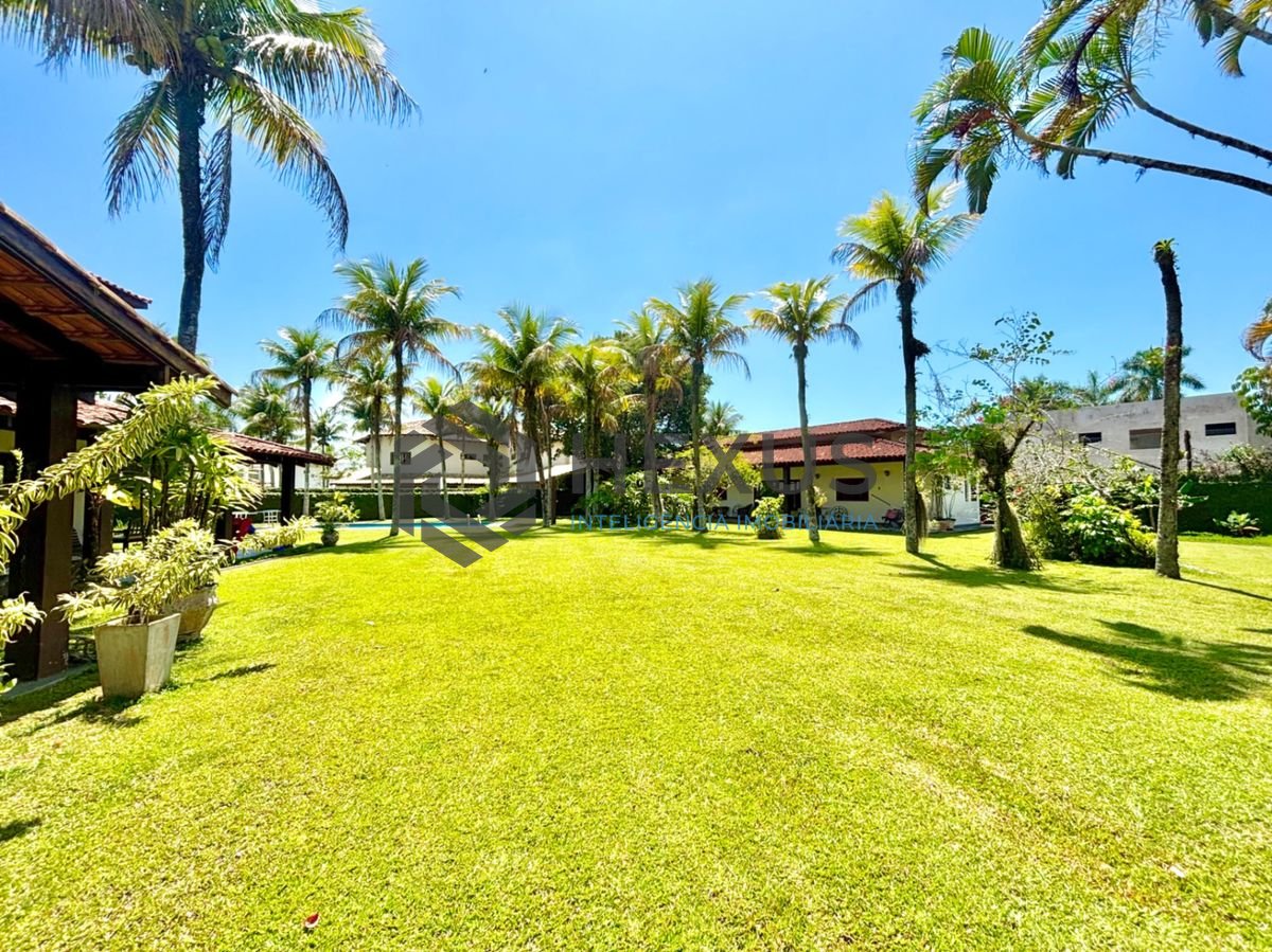 Foto 4 de Casa reformada com piscina e área gourmet no Jardim Acapulco, Guarujá