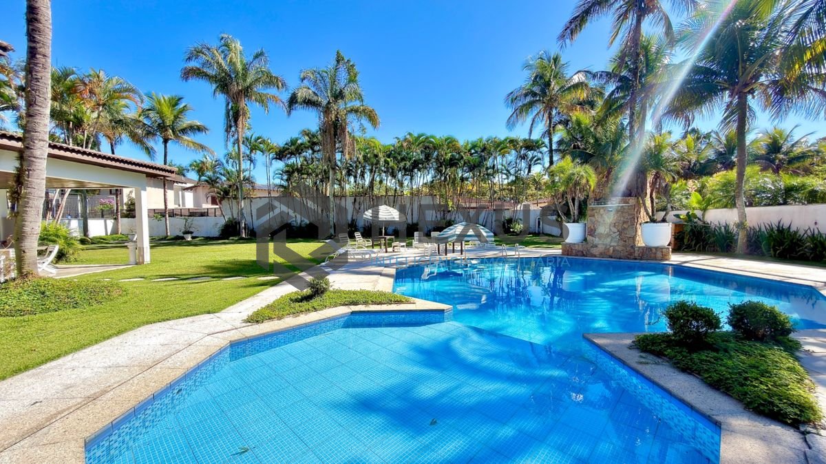 Foto 4 de Casa reformada com piscina e área gourmet no Jardim Acapulco, Guarujá