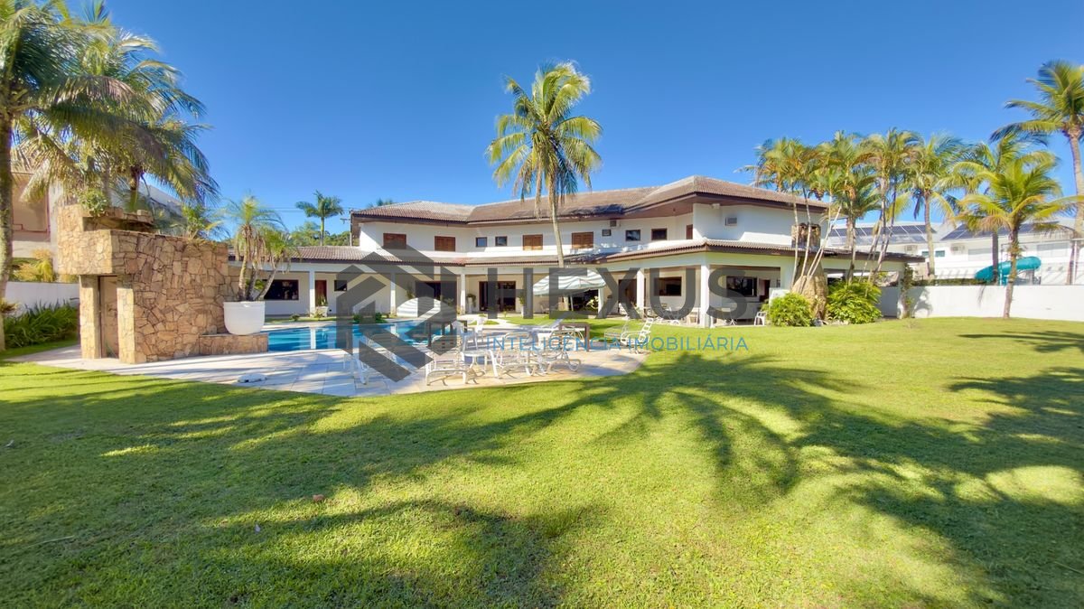 Foto 3 de Casa reformada com piscina e área gourmet no Jardim Acapulco, Guarujá