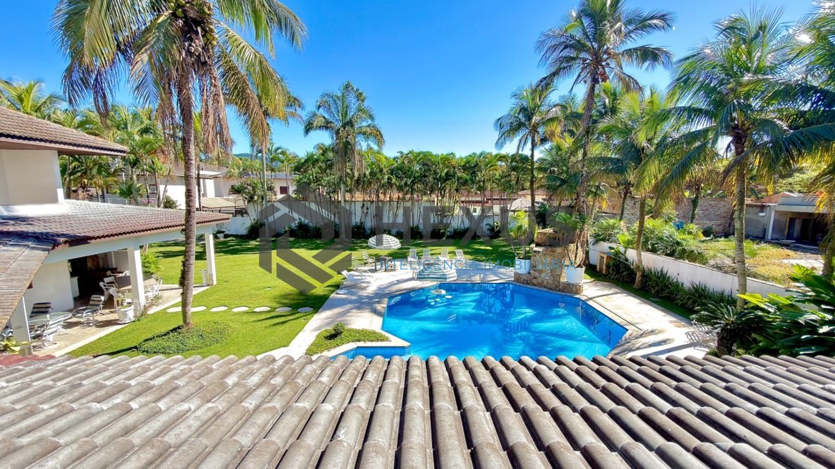 Foto 17 de Casa reformada com piscina e área gourmet no Jardim Acapulco, Guarujá