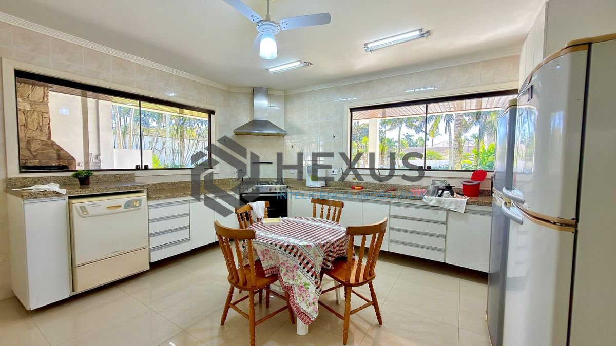 Foto 12 de Casa reformada com piscina e área gourmet no Jardim Acapulco, Guarujá