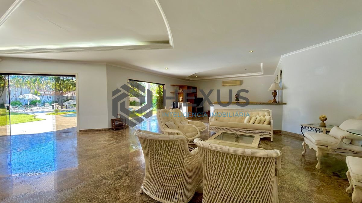Foto 7 de Casa reformada com piscina e área gourmet no Jardim Acapulco, Guarujá