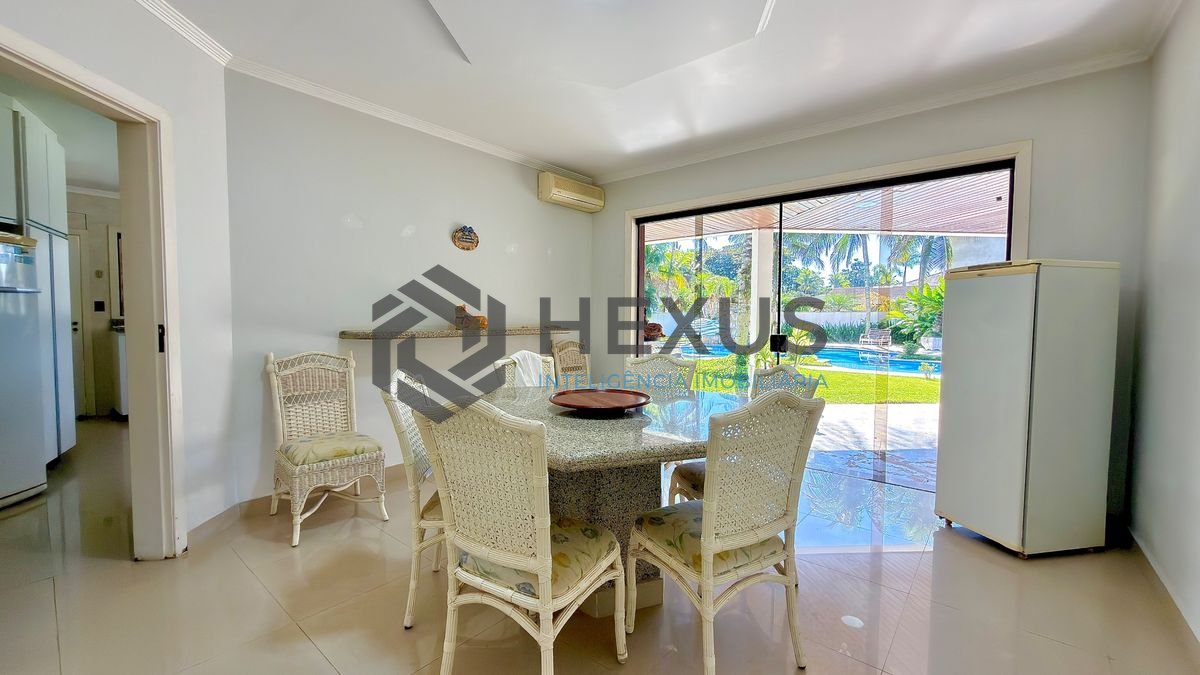 Foto 11 de Casa reformada com piscina e área gourmet no Jardim Acapulco, Guarujá
