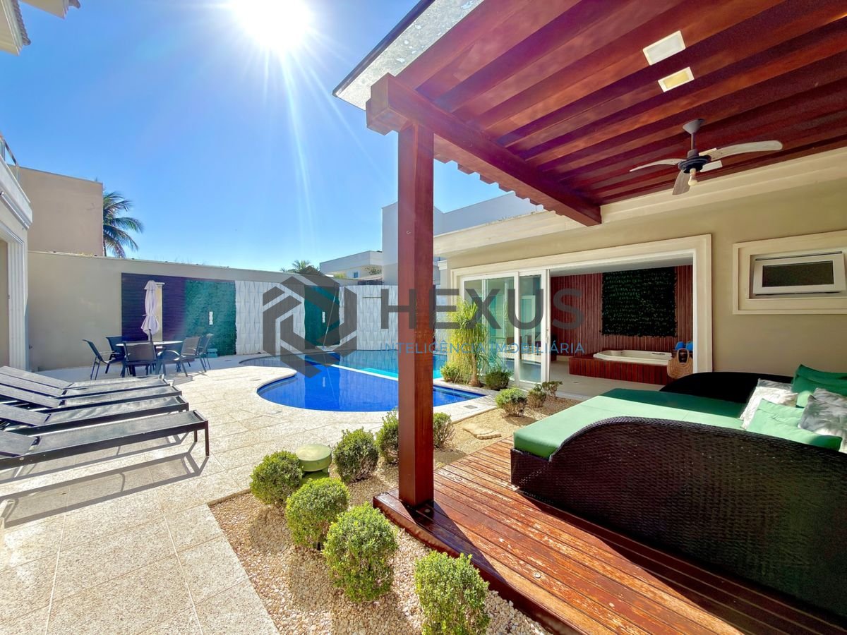 Foto 5 de Casa reformada com piscina e área gourmet no Jardim Acapulco, Guarujá