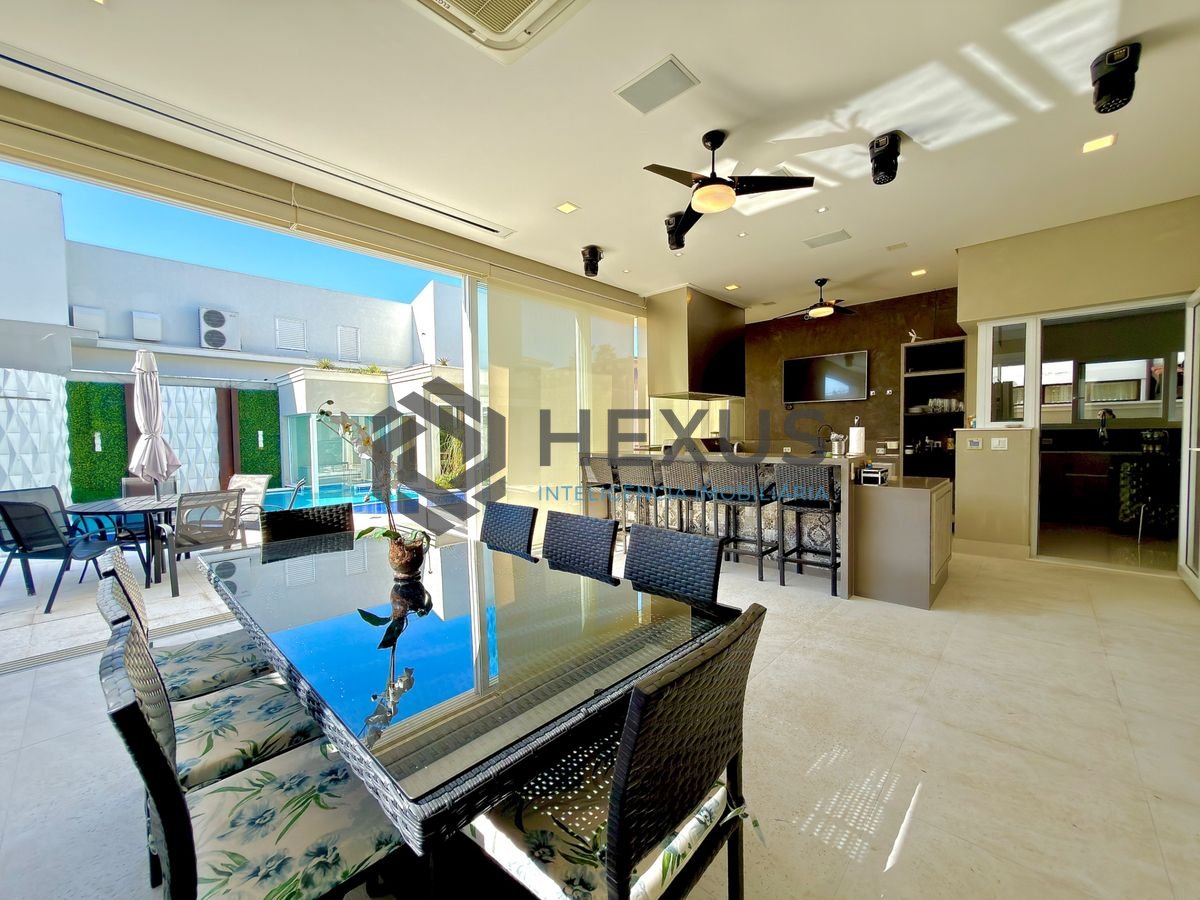 Foto 7 de Casa reformada com piscina e área gourmet no Jardim Acapulco, Guarujá