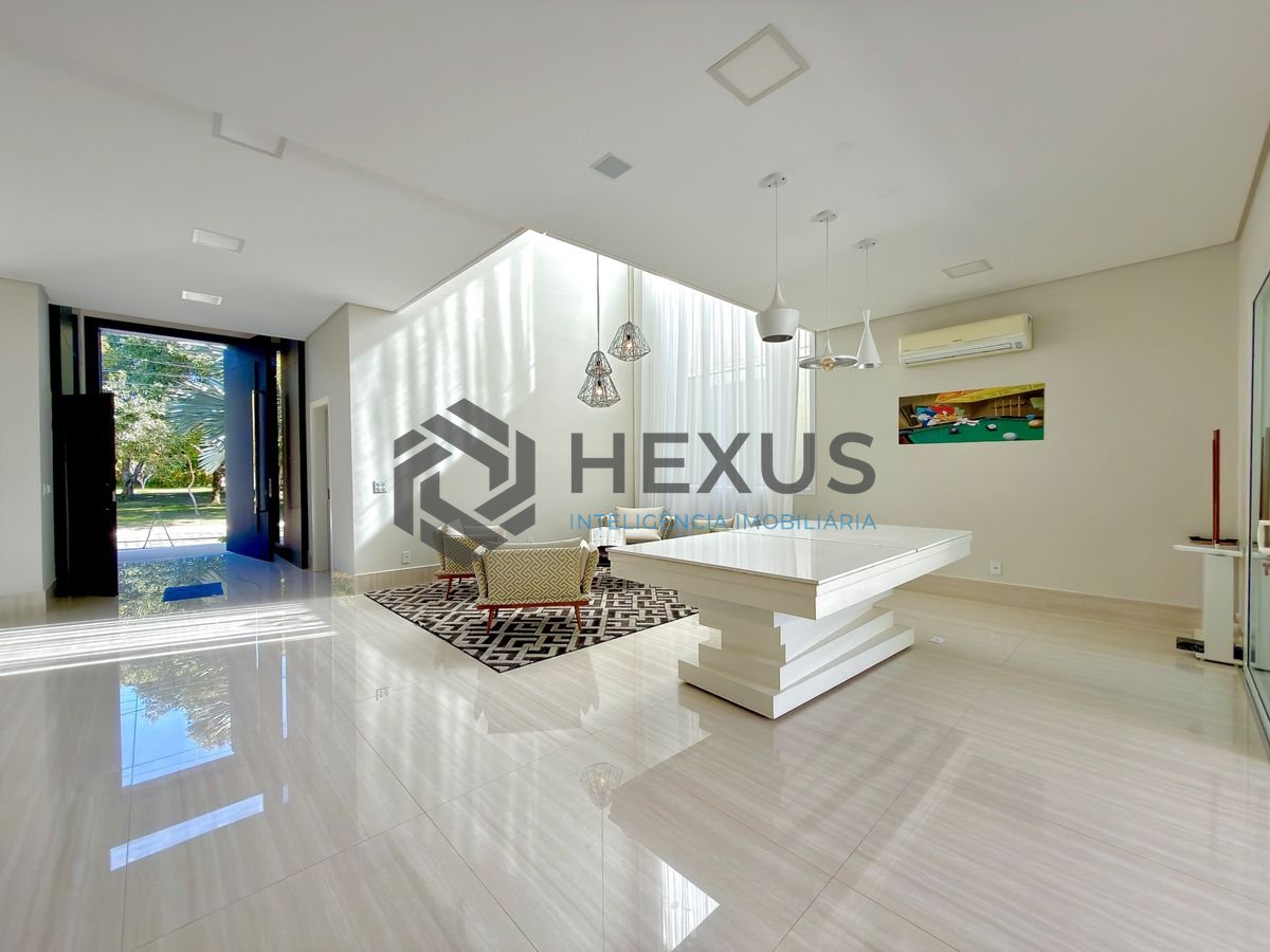 Foto 10 de Casa reformada com piscina e área gourmet no Jardim Acapulco, Guarujá
