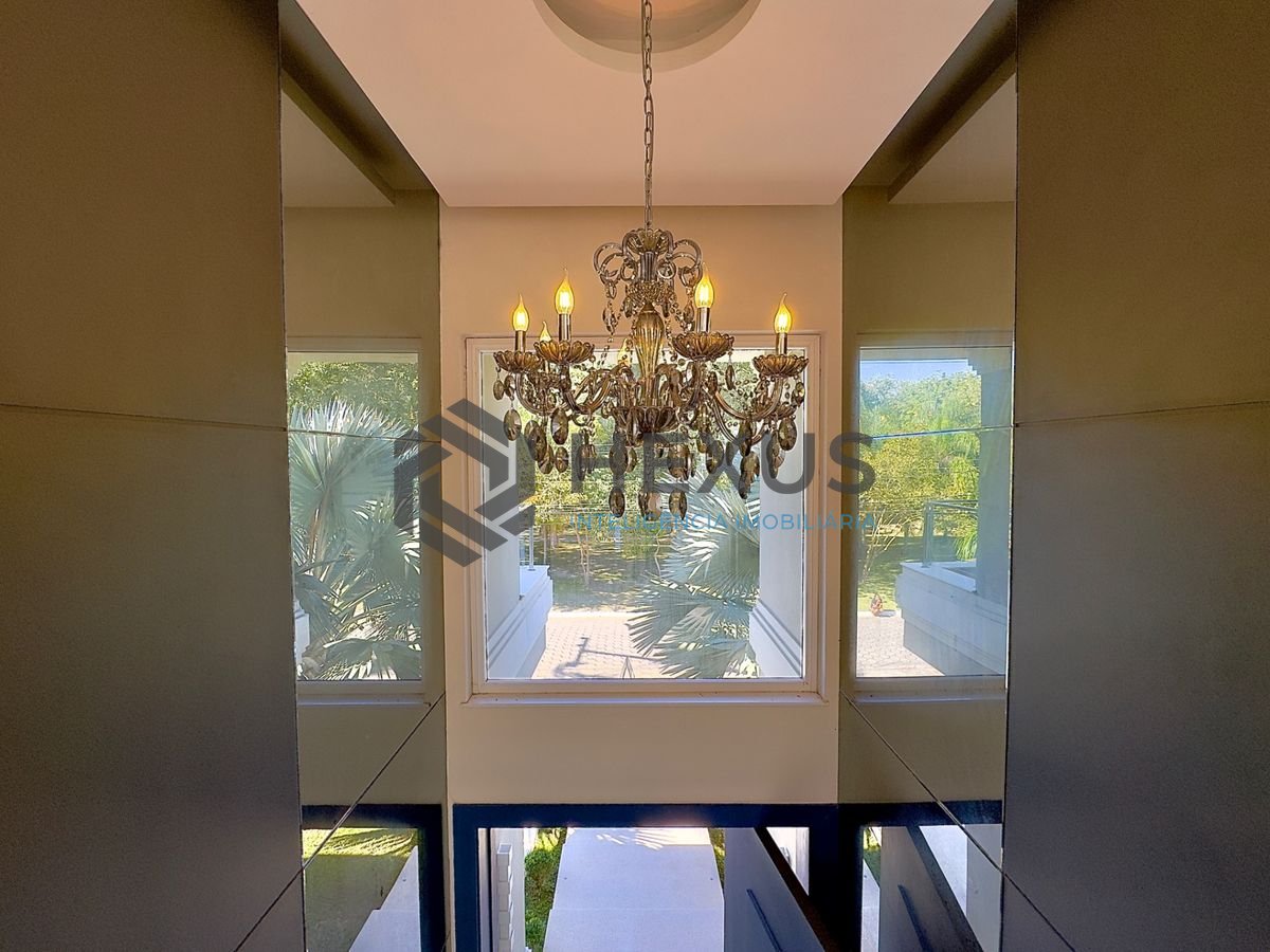Foto 16 de Casa reformada com piscina e área gourmet no Jardim Acapulco, Guarujá