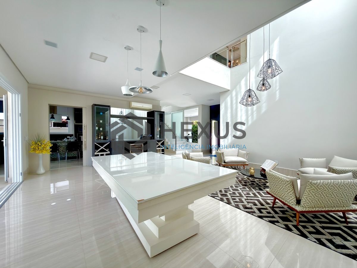 Foto 9 de Casa reformada com piscina e área gourmet no Jardim Acapulco, Guarujá