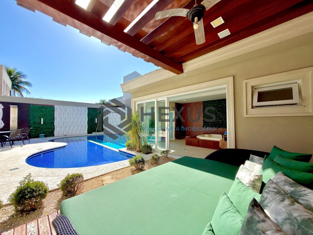 Foto 8 de Casa reformada com piscina e área gourmet no Jardim Acapulco, Guarujá